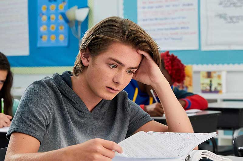 Middle school student taking test